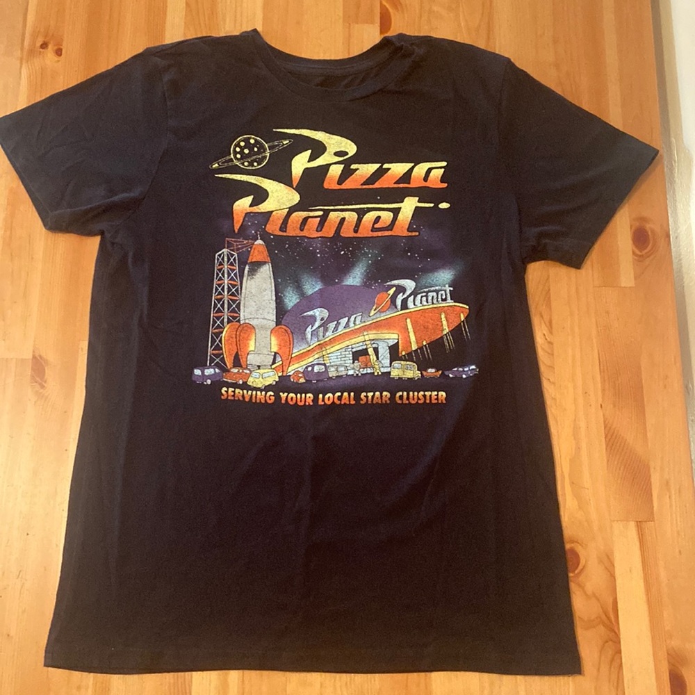 Disney / Pixar Toy Story Pizza Planet Posse Serving Your Local Star Cluster Tee.